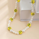 Riolio Boho Handmade Beaded Smiling Face Pearl Collar Clavicle Chain Fashion Imitation Pearl Necklace for Men Women Korean Jewelry