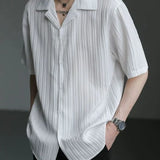 Riolio  Men Casual Cuban Collar Short Sleeve Shirt Vertical Striped Textured Loose Fit Button Down Shirt For Daily Streetwear