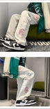 Riolio  American style high street loose fitting straight leg personalized jeans for men and women hip-hop trend printed casual pants
