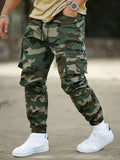 Riolio  Men Camo Print Cargo Pants With Flap Pockets And Drawstring Waist Streetwear Long Pants