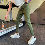 Riolio  New Summer High-end Casual Minimalist Design, High Waisted Drawstring Vertical Stripe Solid Color Harlan Pants for Men
