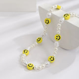 Riolio Boho Handmade Beaded Smiling Face Pearl Collar Clavicle Chain Fashion Imitation Pearl Necklace for Men Women Korean Jewelry