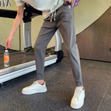 Riolio  New Summer High-end Casual Minimalist Design, High Waisted Drawstring Vertical Stripe Solid Color Harlan Pants for Men