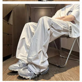 Riolio  Spring Autumn Men's Clothing Solid Color Elastic Pockets Drawstring High Waist Loose Casual Button Trousers Cargo Straight Pants