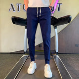 Riolio  New Summer High-end Casual Minimalist Design, High Waisted Drawstring Vertical Stripe Solid Color Harlan Pants for Men