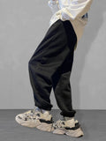 Men Tropical And Letter Graphic Sweatpants