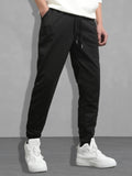 Men Drawstring Waist Slant Pocket Sweatpants