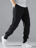 Men Drawstring Waist Slant Pocket Sweatpants